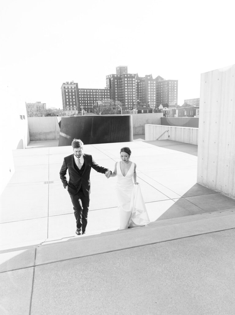 Bride and groom walking together during their wedding day